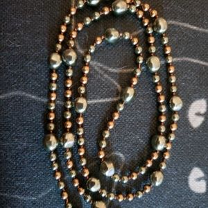 Green and gold bead necklace